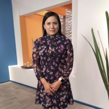 Dr. Claudia Flores Flores
